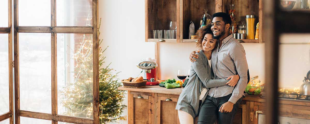 Happy couple enjoying remodeled home